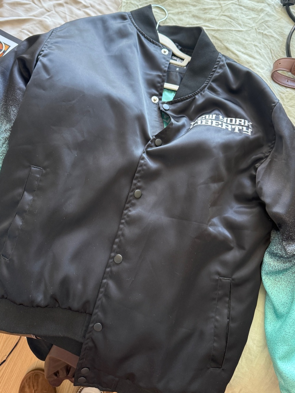 NY Liberty WNBA Black Bomber Jacket with Teal Gradient Sleeves